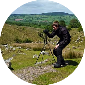 Image of me taking photos in the Brecon Beacons on a motorbike trip